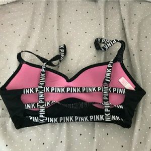 Pink vs black cage push up bra